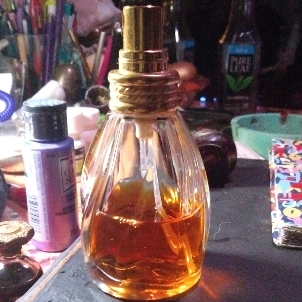 Elegant Gold and Clear Perfume Bottle